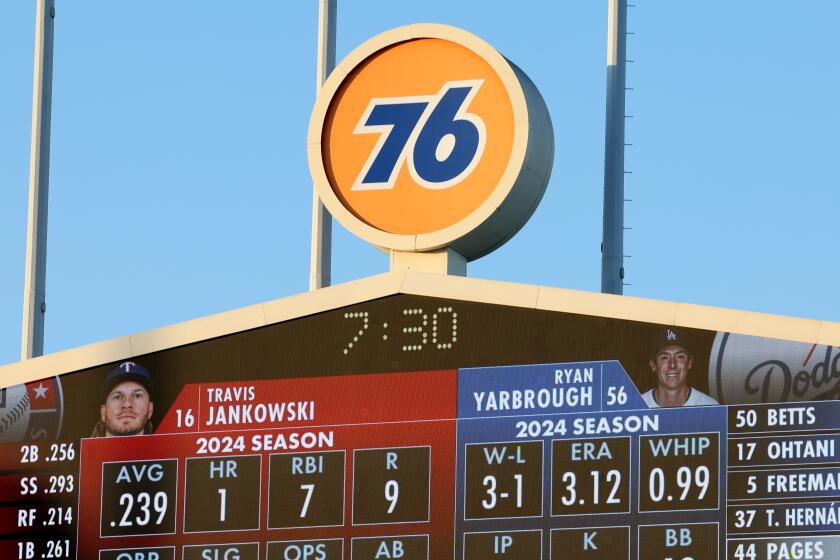 LOS ANGELES CALIFORNIA CALIFORNIA- a 76 sign hangs over Dodgers Stadium during a recent game. (Wally Skalij/Los Angeles Times)