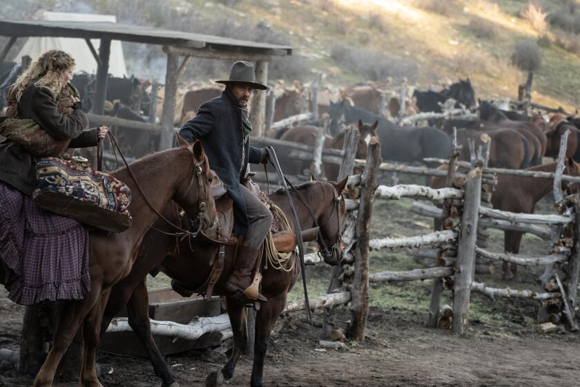 Abbey Lee as Marigold and Kevin Costner as Hayes Ellison in "Horizon: An American Saga - Chapter One."