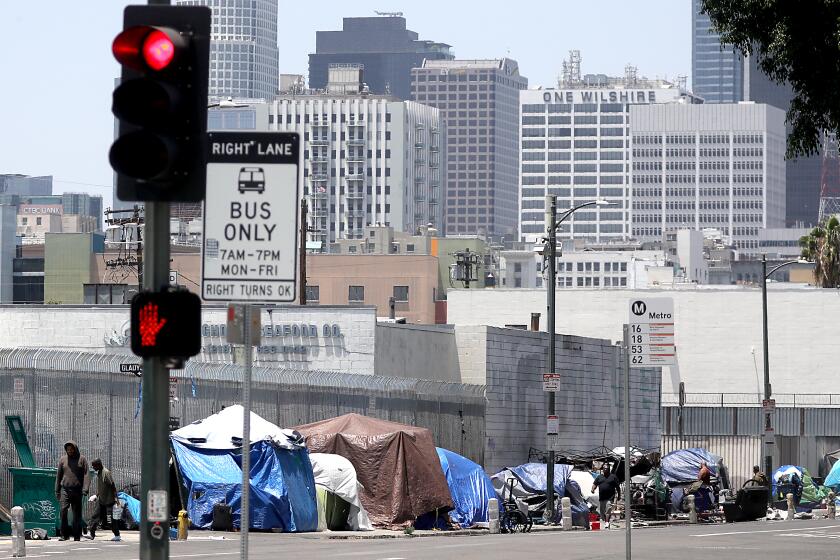 Los Angeles, CA - Tents that serve as shelter for homeles people line the sidewalk along FGifth Street in downtown Los Angeles. The homeless population continued to rise dramatically in the last year, increasing by 9% in Los Angeles County and 10% in the city of Los Angeles. Efforts to house people, which include hundreds of millions of dollars spent on shelter, permanent housing and outreach, have failed to stem the growth of street encampments, as reflected in the annual point-in-time count released Thursday, June 29, 2023, by the Los Angeles Homeless Services Authority. June 29: in Los Angeles on Thursday, June 29, 2023 in Los Angeles, CA. (Luis Sinco / Los Angeles Times)