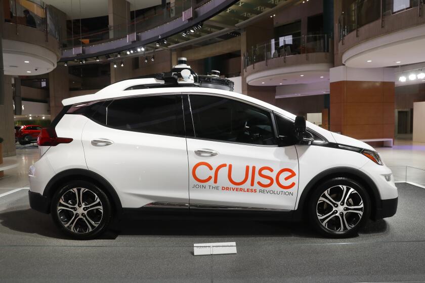 FILE - In this Jan. 16, 2019, file photo, Cruise AV, General Motor's autonomous electric Bolt EV is displayed in Detroit. Autonomous vehicle taxis are up and running in San Francisco and the public has been invited to try one out. Employees of General Motors and its autonomous vehicle subsidiary Cruise have been testing out the service for weeks, but on Tuesday, Feb. 1, 2022, Cruise posted a signup page for anyone to reserve a free — for now — ride in one. (AP Photo/Paul Sancya, File)