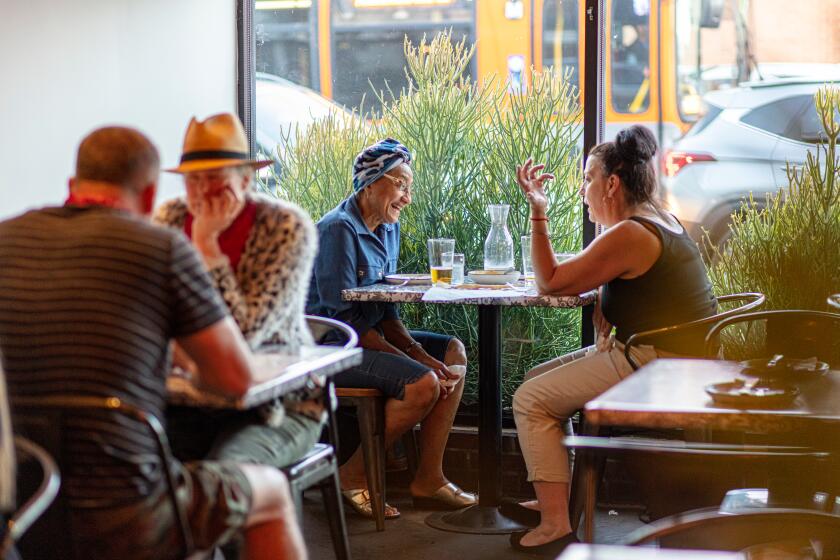 LOS ANGELES, CALIFORNIA, Nov. 5, 2021: Early-evening customers dine at Mizlala on Friday, Nov. 5, 2021, at the restarant's second location in Sherman Oaks. (Silvia Razgova / For the Times) ATTN: 866896-la-fo-2021-101-mizlala