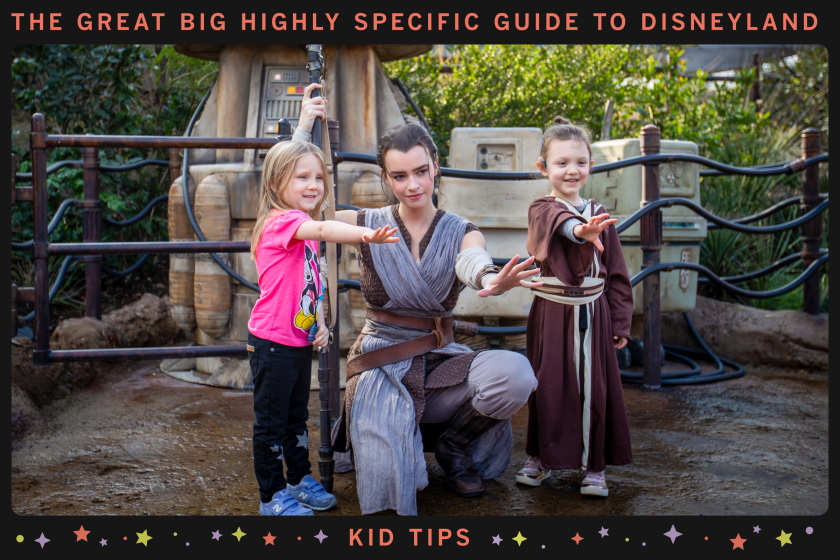 ANAHEIM, CALIF. -- THURSDAY, JANUARY 16, 2020: A cast member dressed as Rey poses for a photo with Penny Remaklus, 4, left, and Adelaide Remaklus, 7, of Ferndale, Washington, during media preview of Star Wars: Rise of the Resistance Media Preview at the Disneyland Resort in Anaheim, Calif., on Jan. 16, 2020. Star Wars: Galaxy's Edge (Allen J. Schaben / Los Angeles Times)