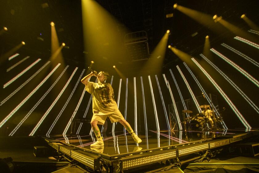 LOS ANGELES, CALIF. -- TUESDAY, JULY 9, 2019: Billie Eilish performs at the Shrine Auditorium in Los Angeles, Calif., on July 9, 2019. (Allen J. Schaben / Los Angeles Times)