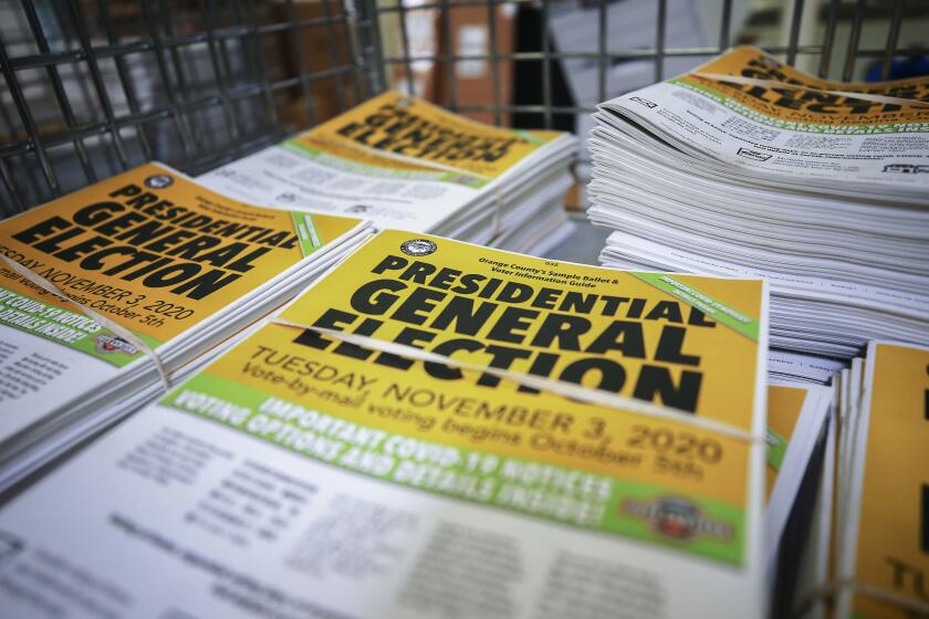 SANTA ANA, CALIFORNIA - OCTOBER 19: Voter information guides sit bundled at the Orange County Registrar of Voters on October 19, 2020 in Santa Ana, California. California Secretary of State Alex Padilla said the state has received about ten times as many ballots this year than at the same stage in the 2016 election. For the first time in state history, all registered California voters were sent a vote by mail ballot in response to the COVID-19 pandemic. (Photo by Mario Tama/Getty Images)