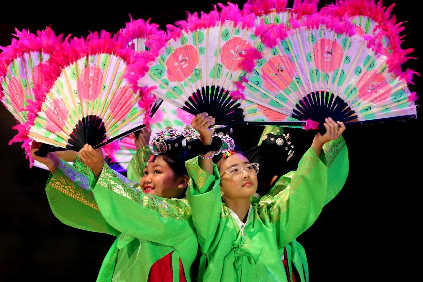 Los Angeles, CA - Students from Cahuenga Elementary School perform a Korean fan dance before Los Angerles Unifoed School District Superintendent Alberto M. Carvalho delivered an Opening of Schools Address at the Walt Disney Concert Hall in Los Angeles on Friday, Aug. 4, 2023. (Luis Sinco / Los Angeles Times)